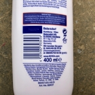 In-Dusch Body Lotion - Strahlend schön - mit Arganöl & sanften Peeling Perlen - Nivea